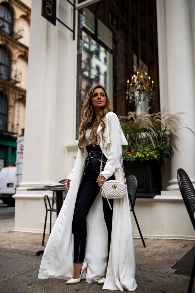 Where to Save vs Splurge on Cult-Favorite Beauty Products | MiaMiaMine.com | fashion blogger mia mia mine wearing a white trench coat from revolve and white christian louboutin heels with a white gucci marmont bag