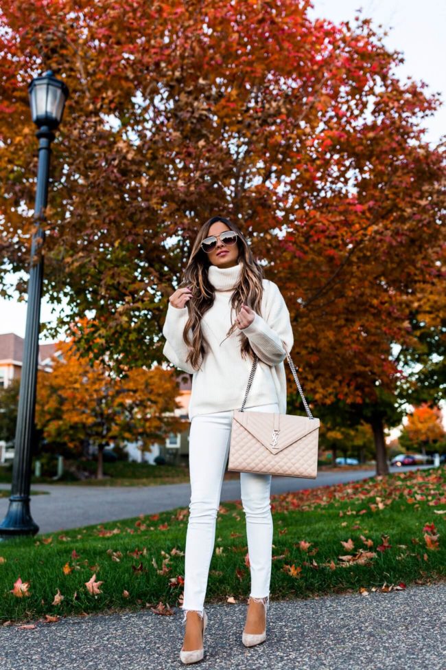 fashion blogger mia mia mine wearing a white outfit for fall 2018