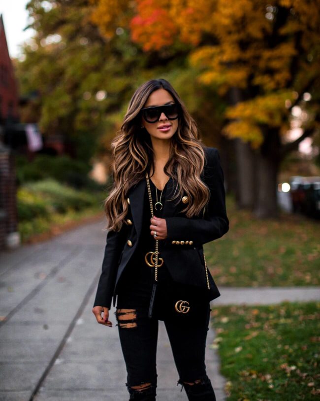 fashion blogger mia mia mine wearing a balmain blazer and a gucci belt and gucci marmont bag from nordstrom