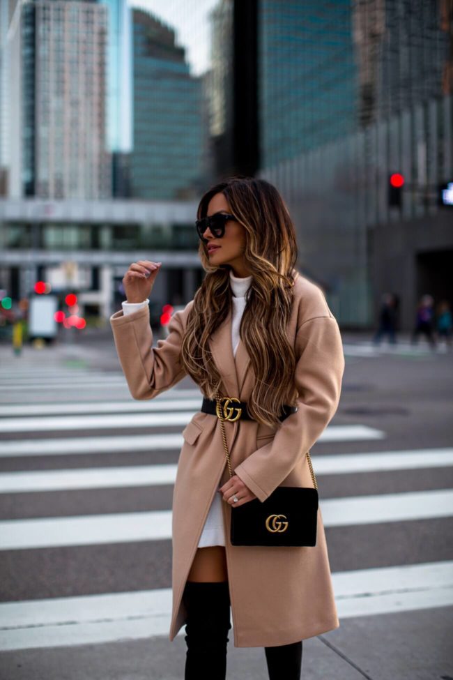 fashion blogger mia mia mine wearing a gucci marmont wallet on chain and a gucci belt