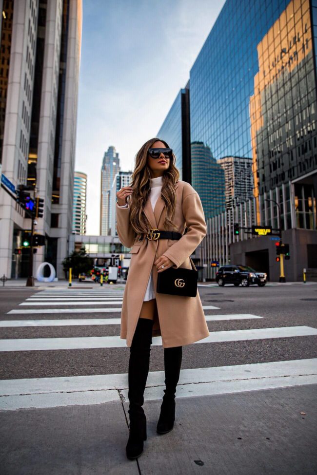 fashion blogger mia mia mine wearing stuart weitzman over-the-knee black boots and a gucci marmont bag