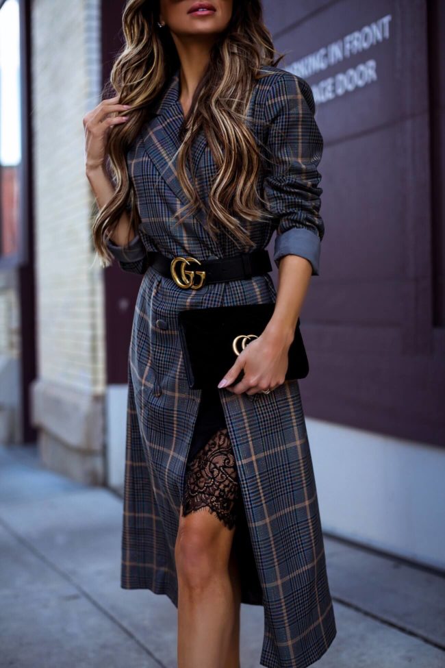 fashion blogger mia mia mine wearing a lace slip dress from revolve and a plaid coat