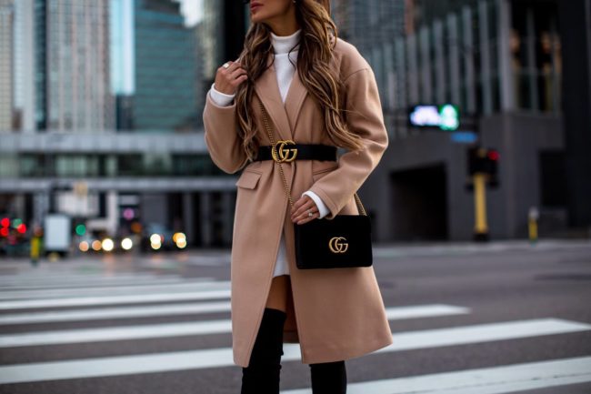fashion blogger mia mia mine wearing a gucci marmont velvet chain wallet and a camel coat