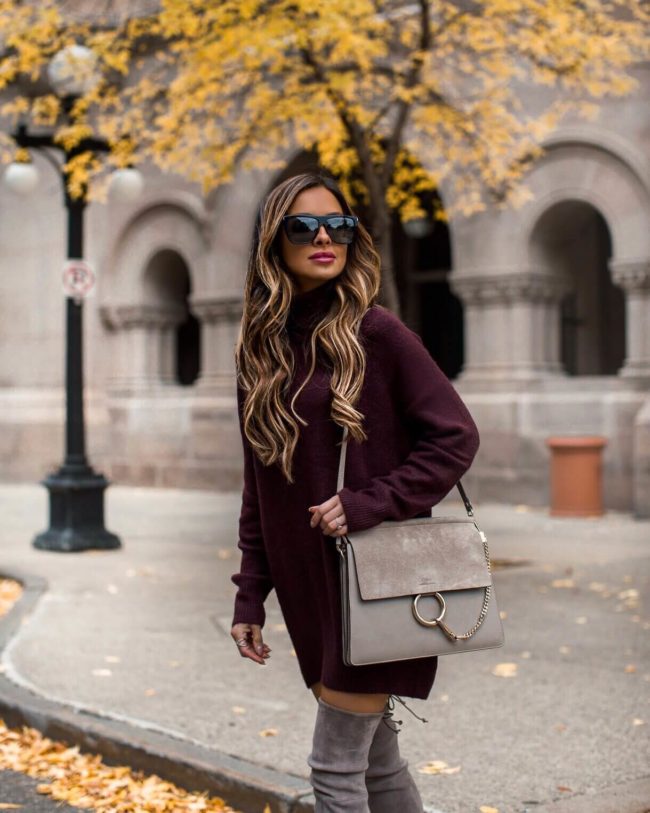 fashion blogger mia mia mine wearing a burgundy sweater dress from H&M and a chloe faye medium bag