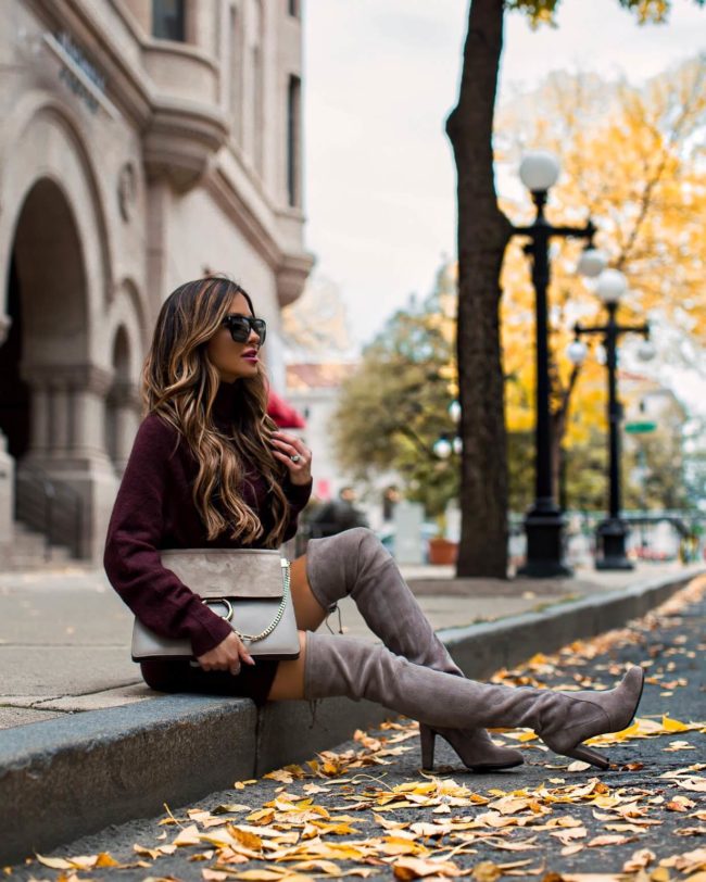 fashion blogger mia mia mine wearing a burgundy sweater dress from H&M and stuart weitzman over-the-knee boots