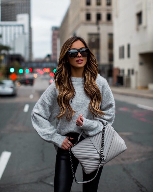 fashion blogger mia mia mine wearing a gray sweater from H&M and a saint laurent college handbag