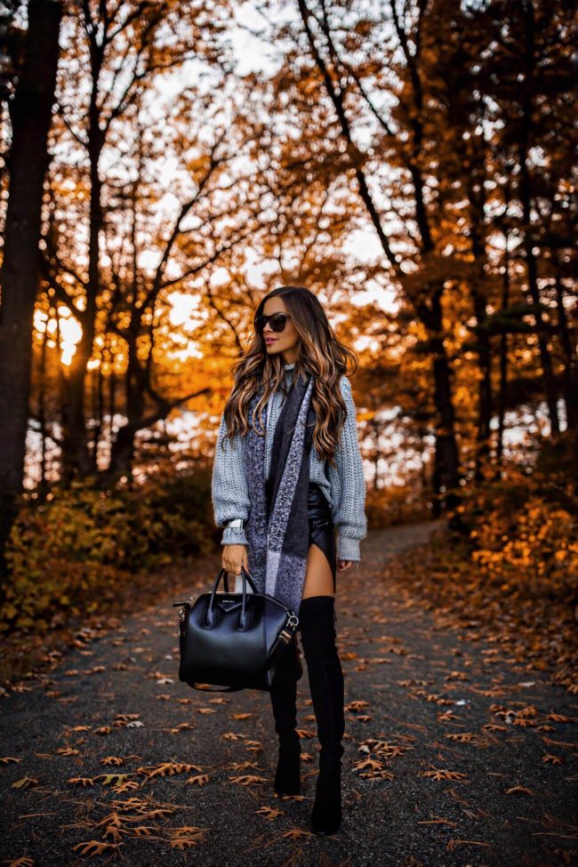 fashion blogger mia mia mine wearing over-the-knee boots and a gray scarf from H&M for fall 2018