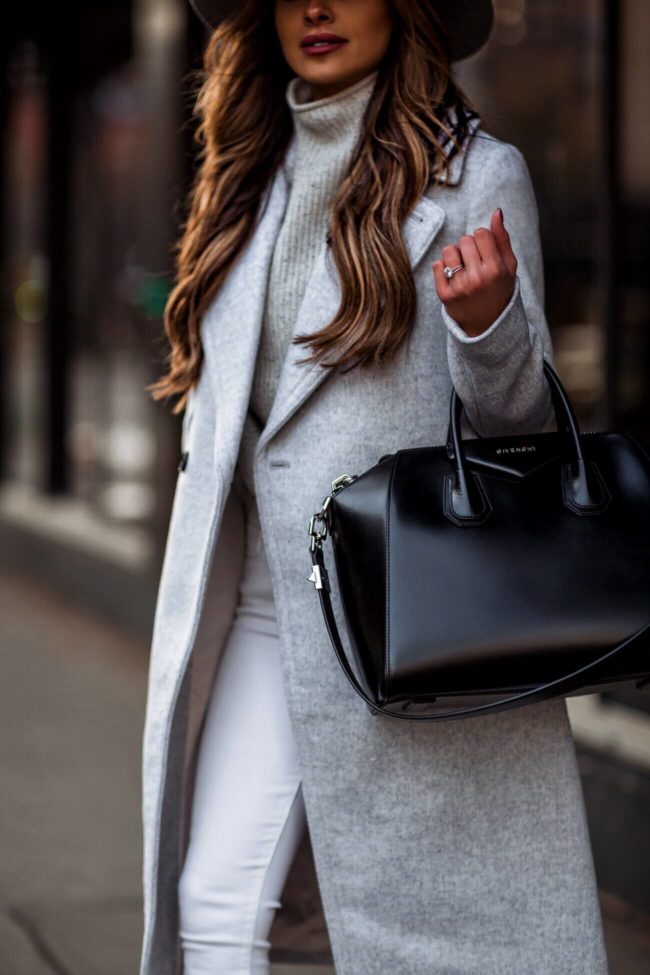 fashion blogger mia mia mine wearing a gray turtleneck sweater and a gray coat from club monaco