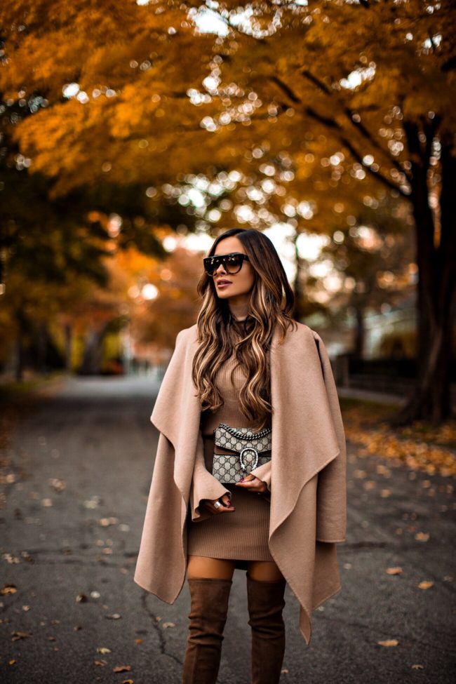 fashion blogger mia mia mine wearing a gucci dionysus bag and a camel waterfall coat
