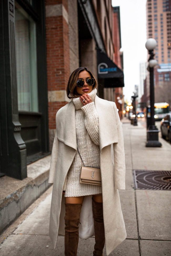 fashion blogger mia mia mine wearing a white coat from mango and a saint laurent sunset bag for winter 2018