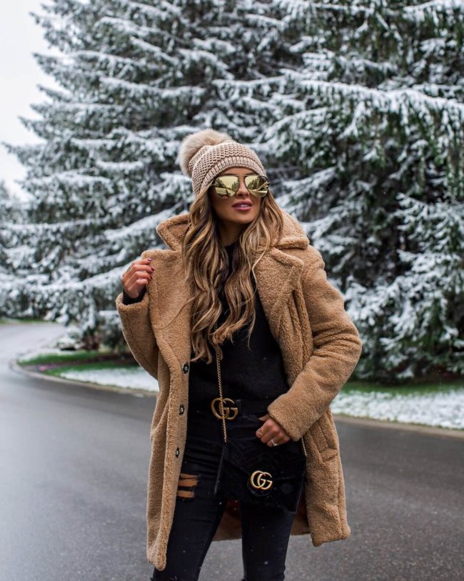 fashion blogger mia mia mine wearing a teddy coat and a gucci belt for winter