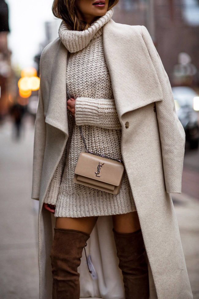 fashion blogger mia mia mine wearing a white winter outfit from mango and a saint laurent sunset bag