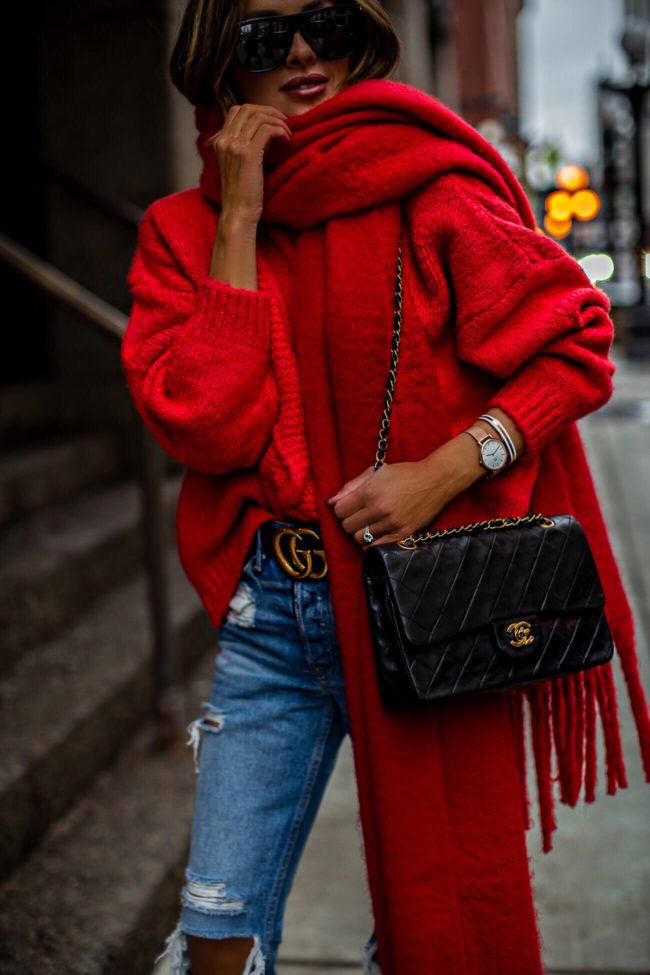 fashion blogger mia mia mine wearing a red sweater from mango and a chanel bag