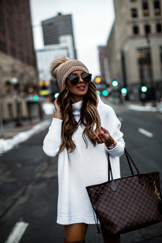 fashion blogger mia mia mine wearing a white free people sweater dress from nordstrom and stuart weitzman over-the-knee-boots