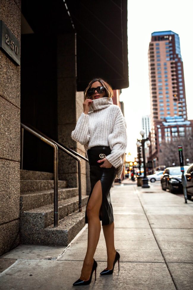 fashion blogger mia mia mine wearing a chunky knit free people sweater on sale december 2018
