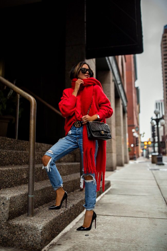 fashion blogger mia mia mine wearing a red mango sweater and a gucci belt with a chanel bag from ebay for holiday 2018