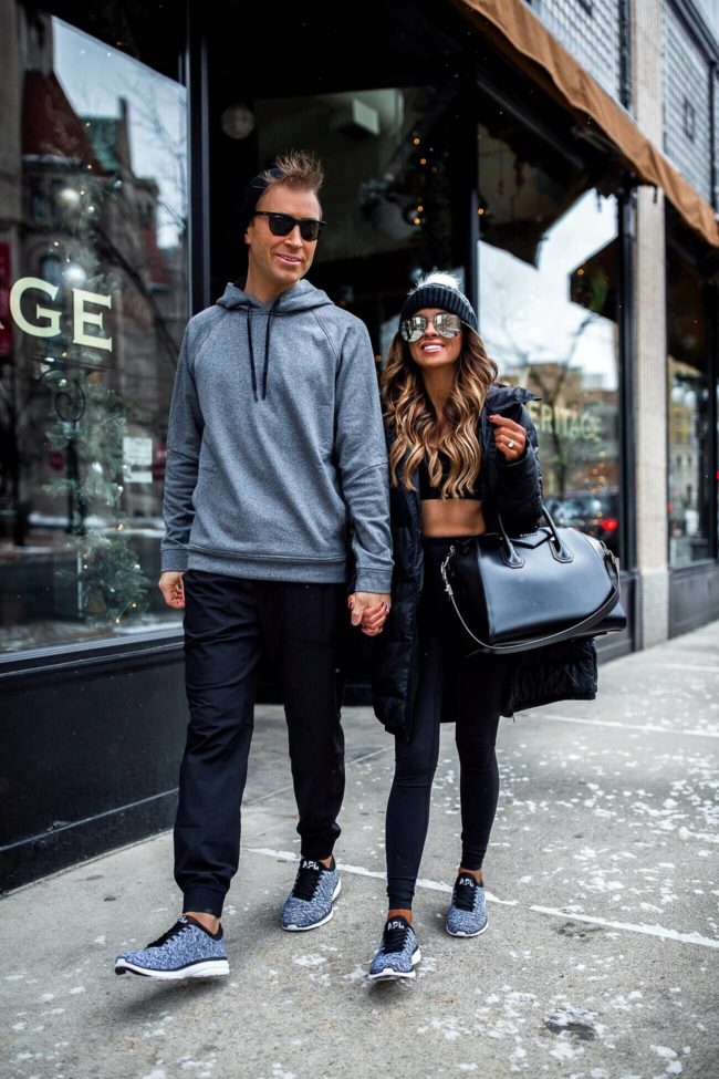 fashion blogger mia mia mine with husband wearing matching lululemon outfits for winter 2018