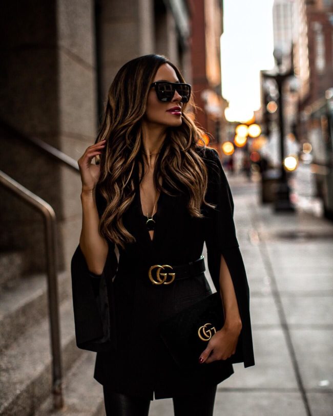 fashion blogger mia mia mine wearing a bcbg slit sleeve blazer with a gucci belt for holiday 2018
