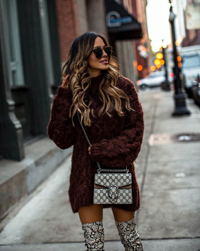 fashion blogger mia mia mine wearing a chunky knit brown sweater dress and snakeskin boots from mango