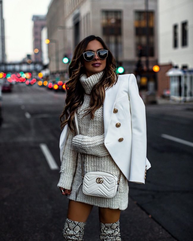 fashion blogger mia mia mine wearing a white balmain blazer and a white gucci bag