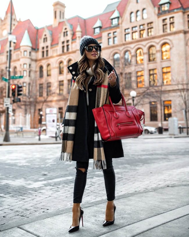 fashion blogger mia mia mine wearing a burberry scarf and a red celine bag
