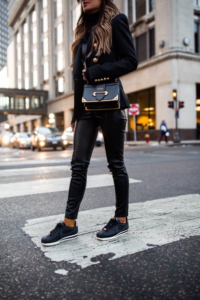 fashion blogger mia mia mine wearing nike cortez sneakers and a prada bag