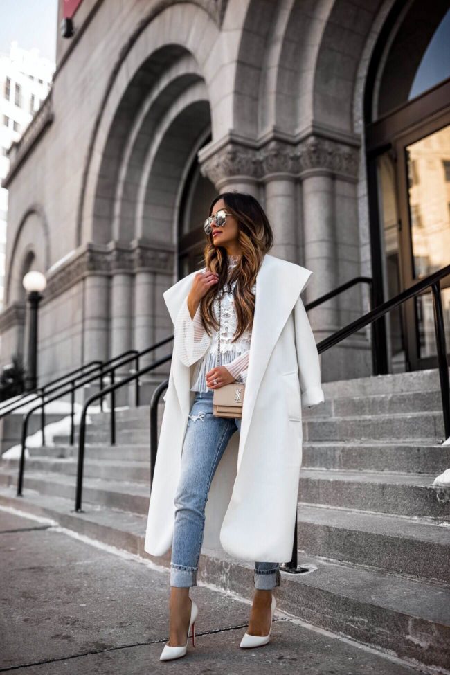fashion blogger mia mia mine wearing a white coat from pretty little thing and a white lace top from revolve
