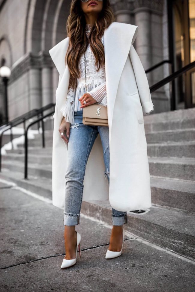 fashion blogger mia mia mine wearing levi's denim and a white pretty little thing coat