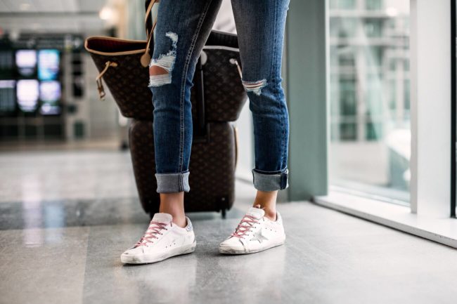 fashion blogger mia mia mine wearing golden goose sneakers from intermix for spring 2019