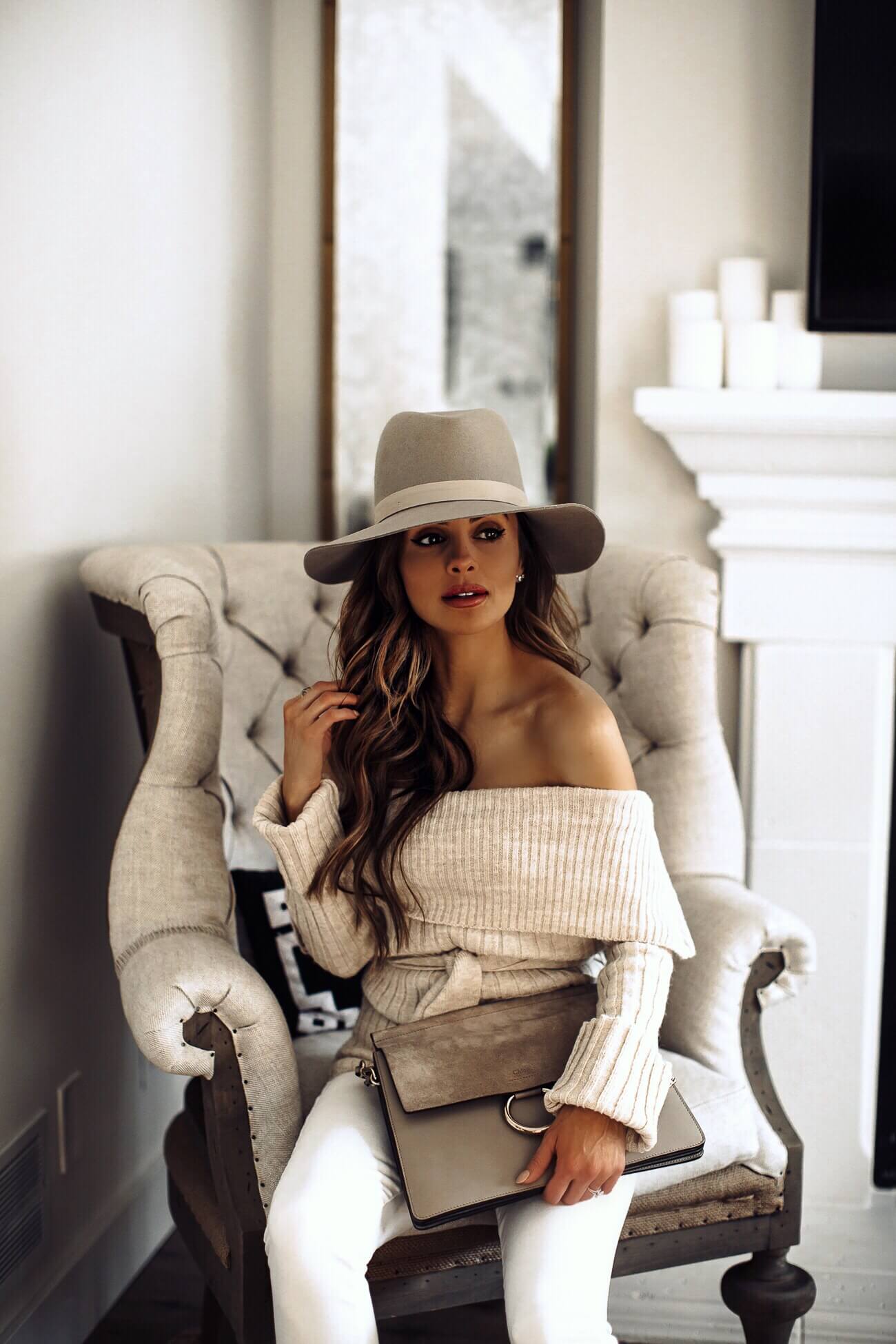 fashion blogger mia mia mine wearing a white sweater and white denim for spring