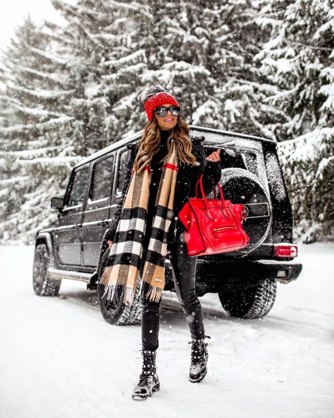 fashion blogger mia mia mine wearing a burberry scarf and a red celine bag