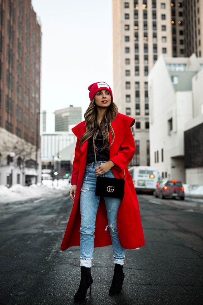 fashion blogger mia mia mine wearing levi's denim and black booties from ann taylor