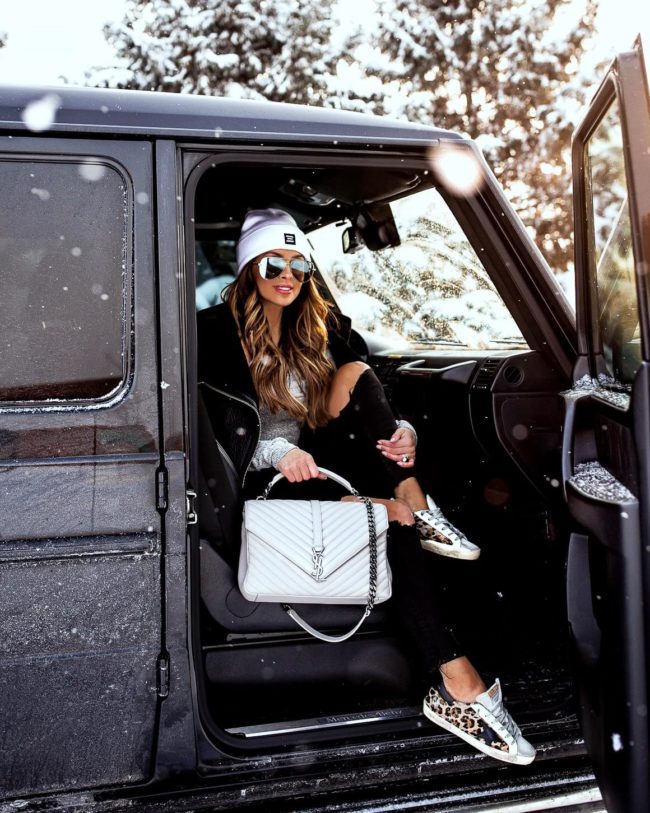 fashion blogger mia mia mine wearing golden goose leopard sneakers