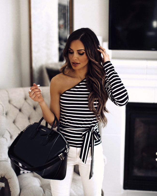fashion blogger mia mia mine wearing a striped one shoulder top from walmart from the sofia jeans collection at walmart