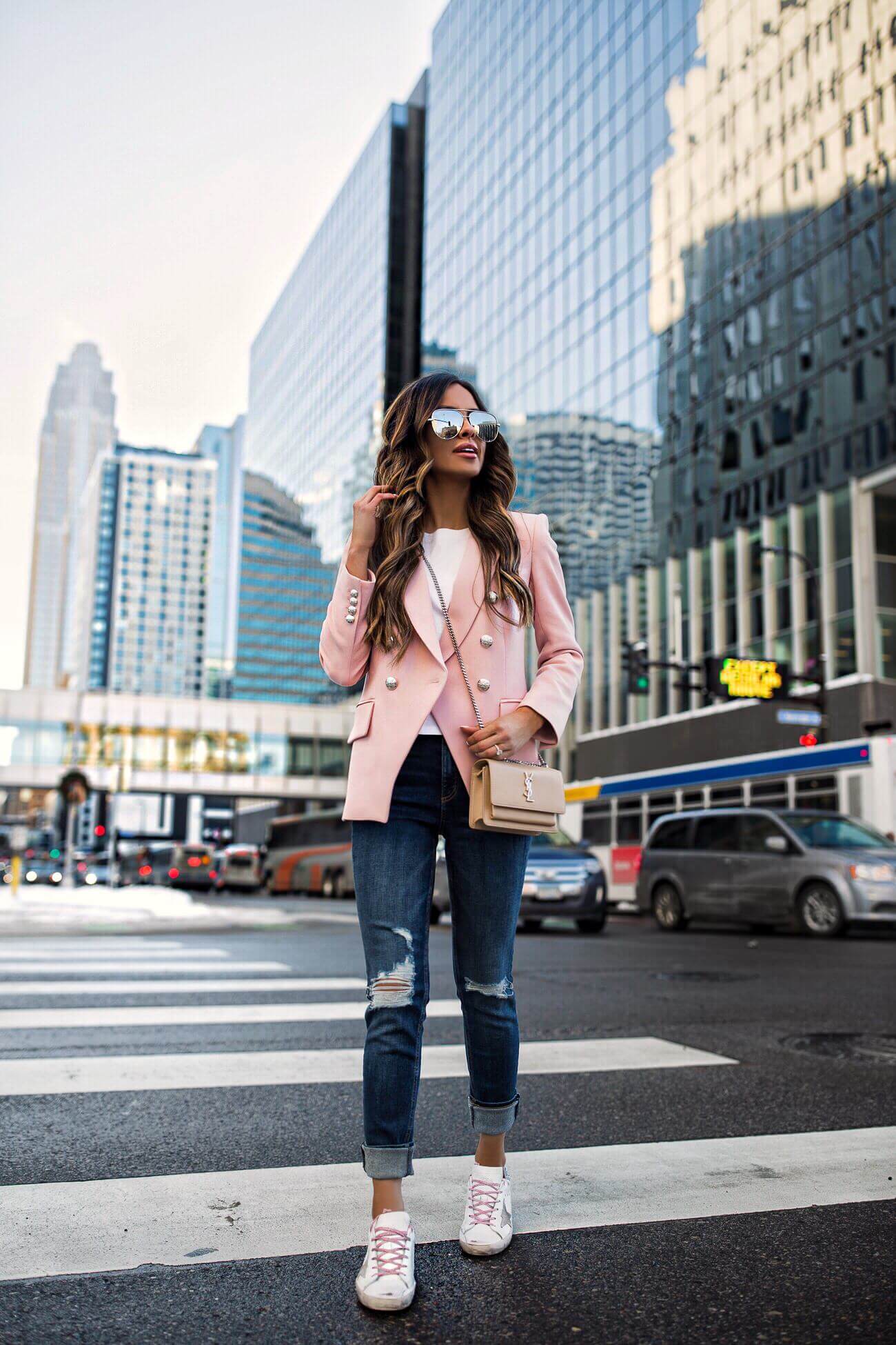fashion blogger mia mia mine wearing a spring outfit from intermix