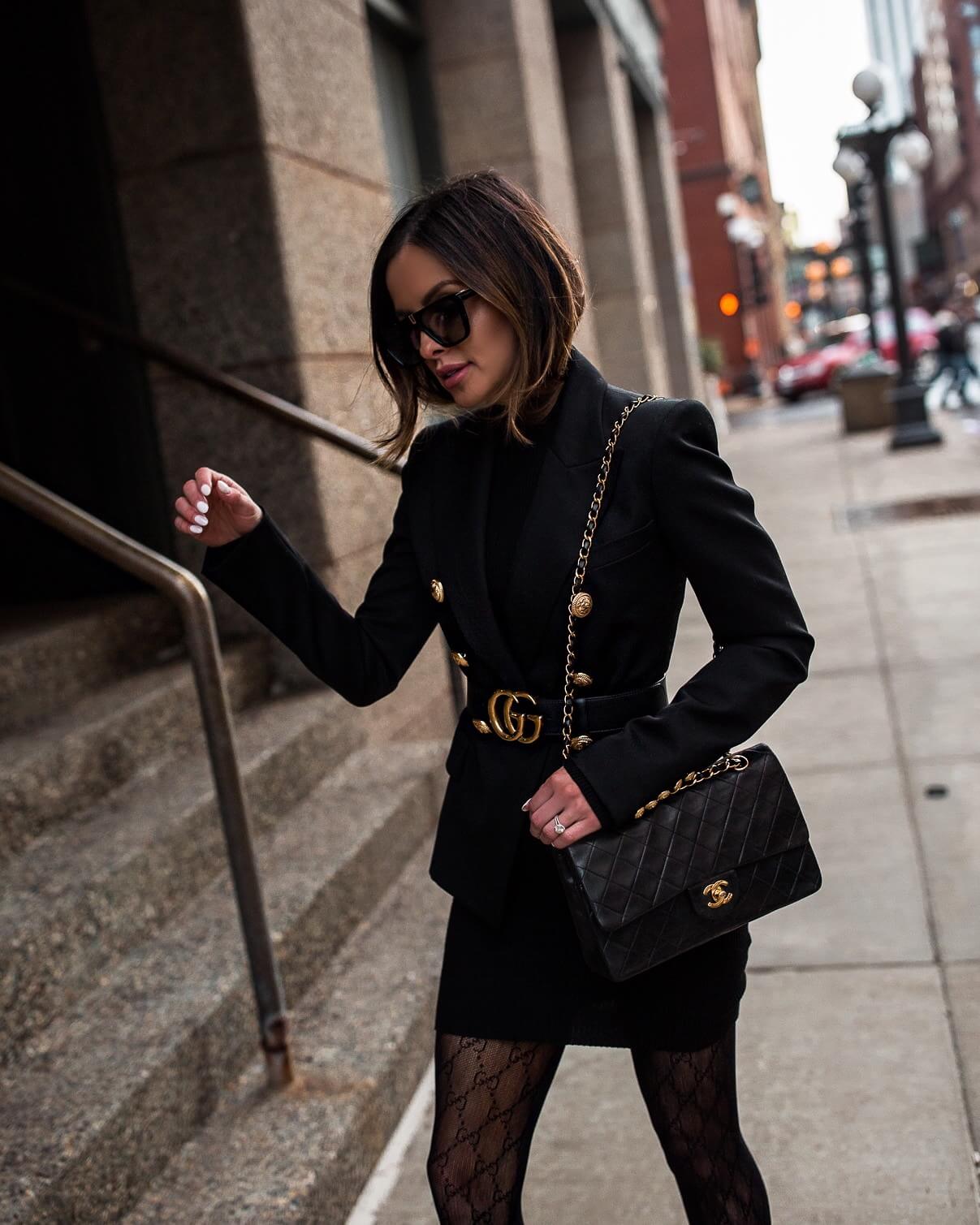 fashion blogger mia mia mine wearing a gucci belt and a balmain blazer