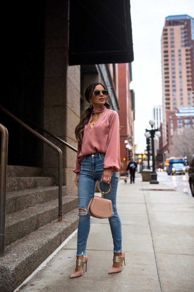 fashion blogger mia mia mine wearing a rose blouse from intermix and a chloe bag