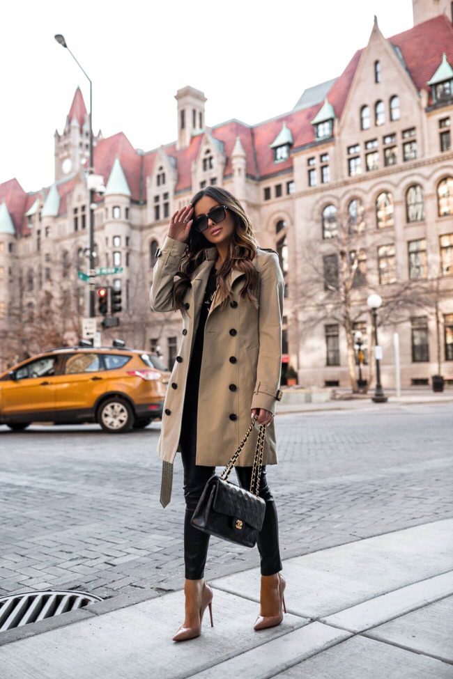 fashion blogger mia mia mine wearing a chanel bag and burberry trench