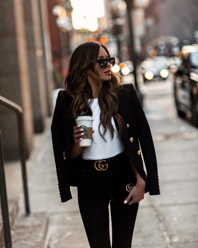 fashion blogger mia mia mine wearing a balmain blazer and a gucci belt