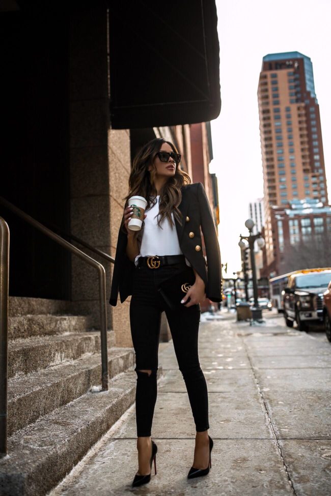 fashion blogger mia mia mine wearing a balmain blazer and a black gucci belt