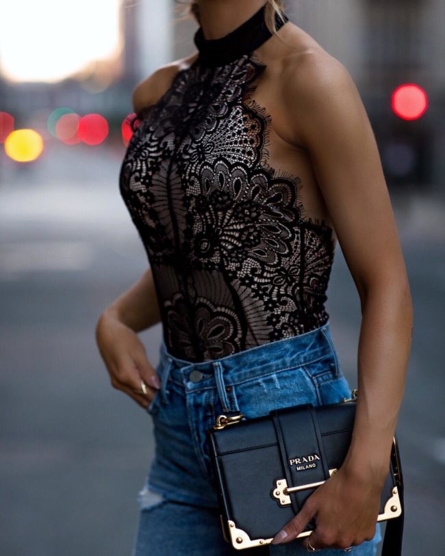 fashion blogger mia mia mine wearing a lace bodysuit from revole and a prada cahier bag