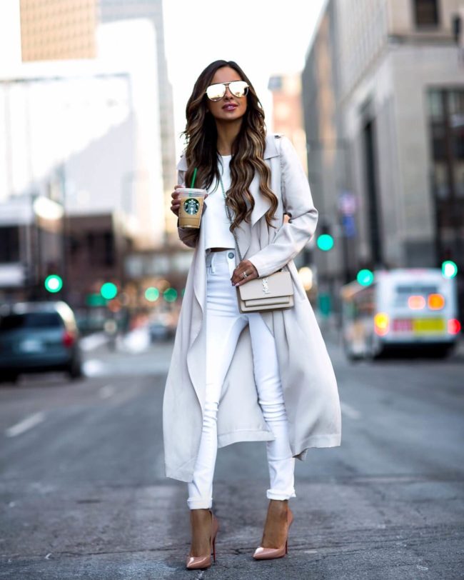 fashion blogger mia mia mine wearing a white trench from nordstrom and white jeans