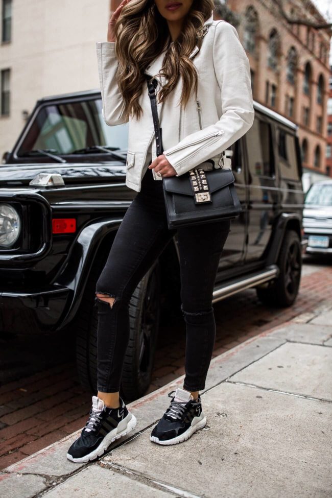 fashion blogger mia mia mine wearing adidas nite jogger sneakers from finish line