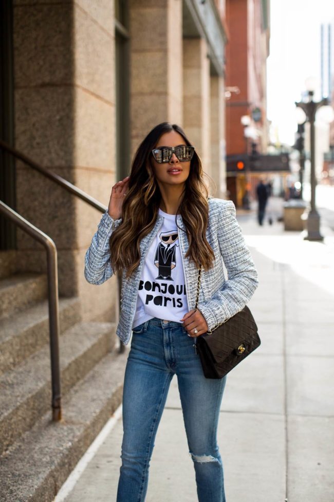 fashion blogger mia mia mine wearing a tweed blazer from bloomingdales and a karl lagerfeld logo tee