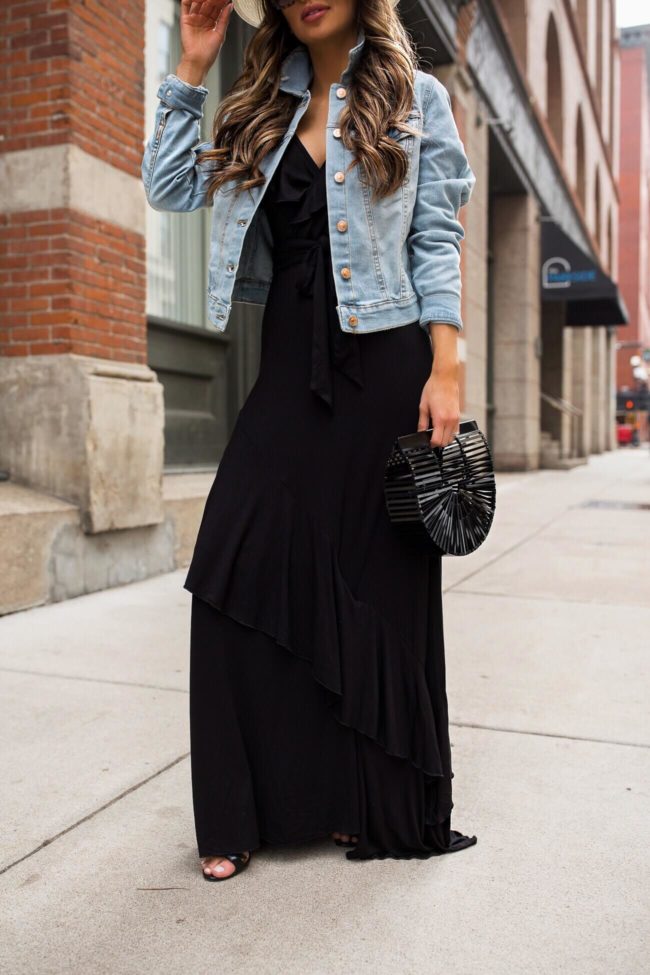 fashion blogger mia mia mine wearing a black maxi dress from the sofia jeans collection at walmart