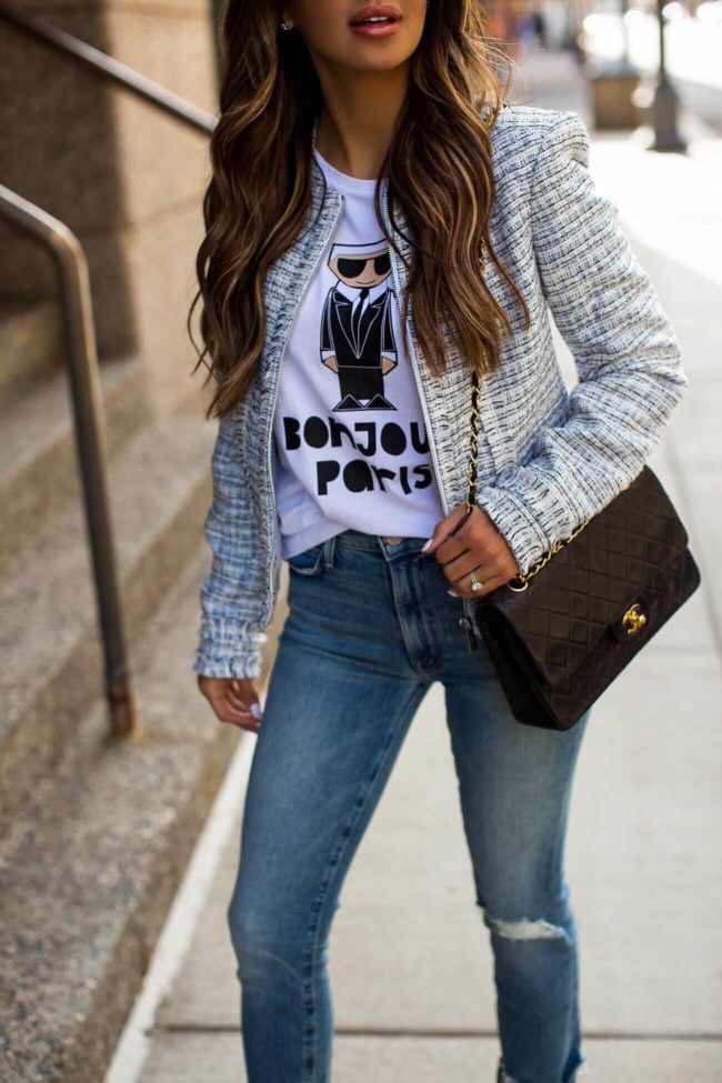 fashion blogger mia mia mine wearing a karl lagerfeld tweed jacket and a chanel bag