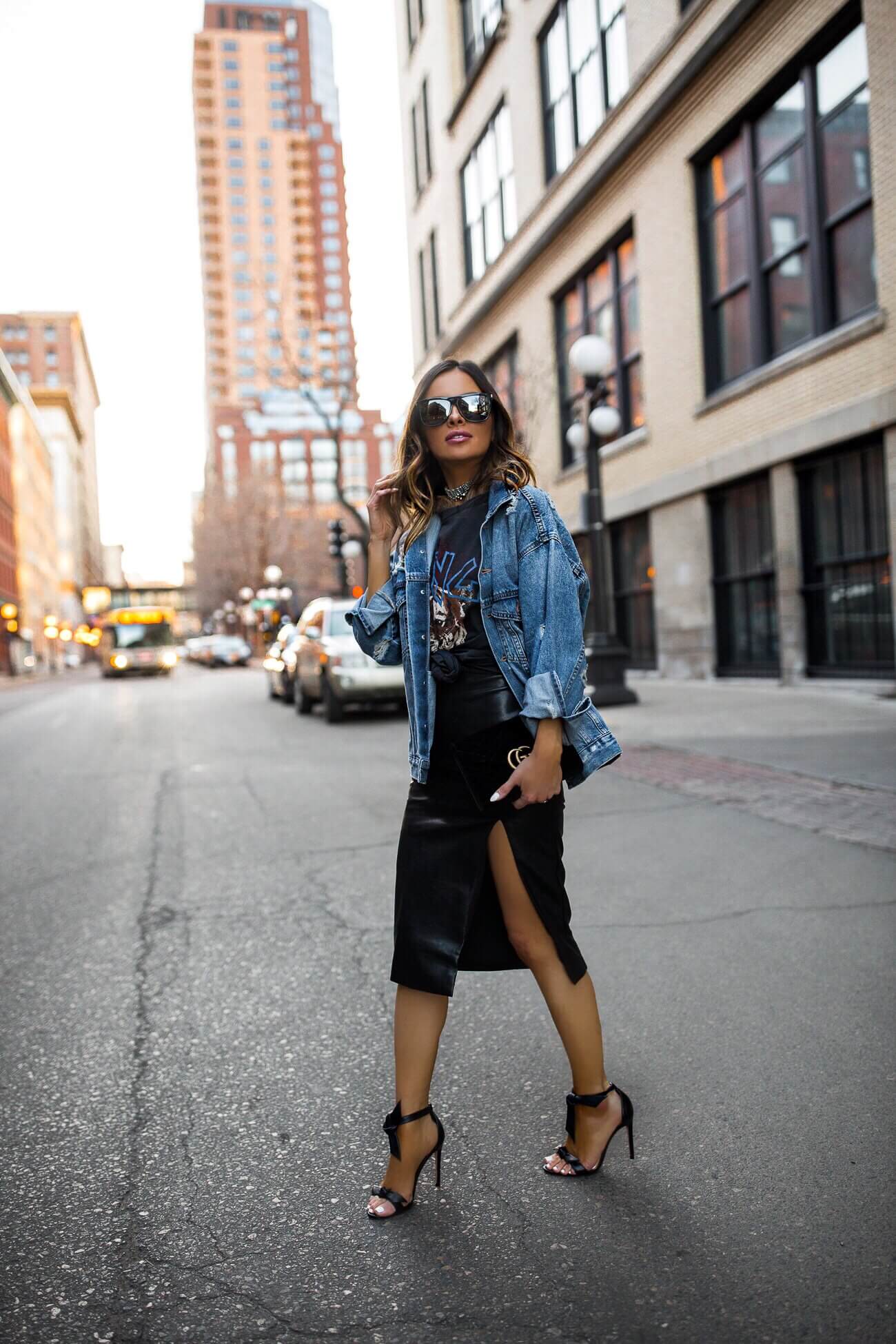fashion blogger mia mia mine wearing a graphic tee and denim jacket for spring