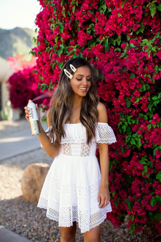Fashion blogger Maria Vizuete of Mia Mia Mine using Patene hair spray in white spring dress