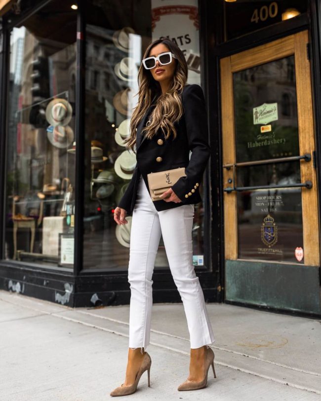 fashion blogger mia mia mine wearing a balmain blazer and white levis jeans
