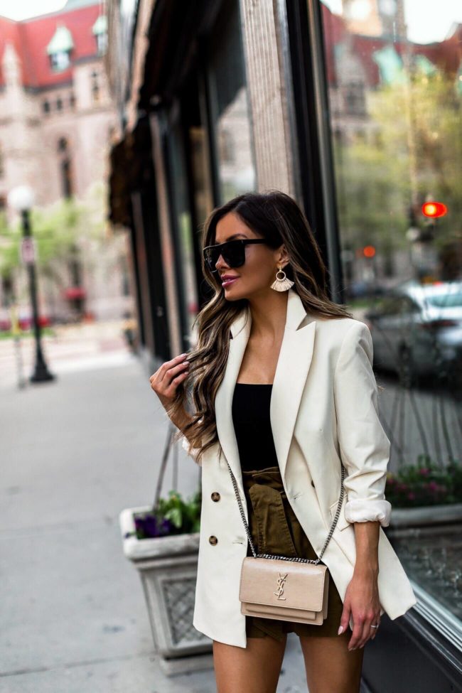 maria vizuete of mia mia mine blog wearing a white topshop blazer and paper bag waist shorts from nordstrom